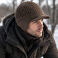 Winter-Strickmütze für Herren mit Schirm und Ohrenklappen